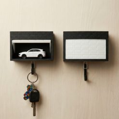 Držač za ključeve garaža sa automatskim otvaranjem vrata